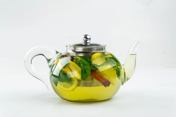 Isolated teapot of apple tea
