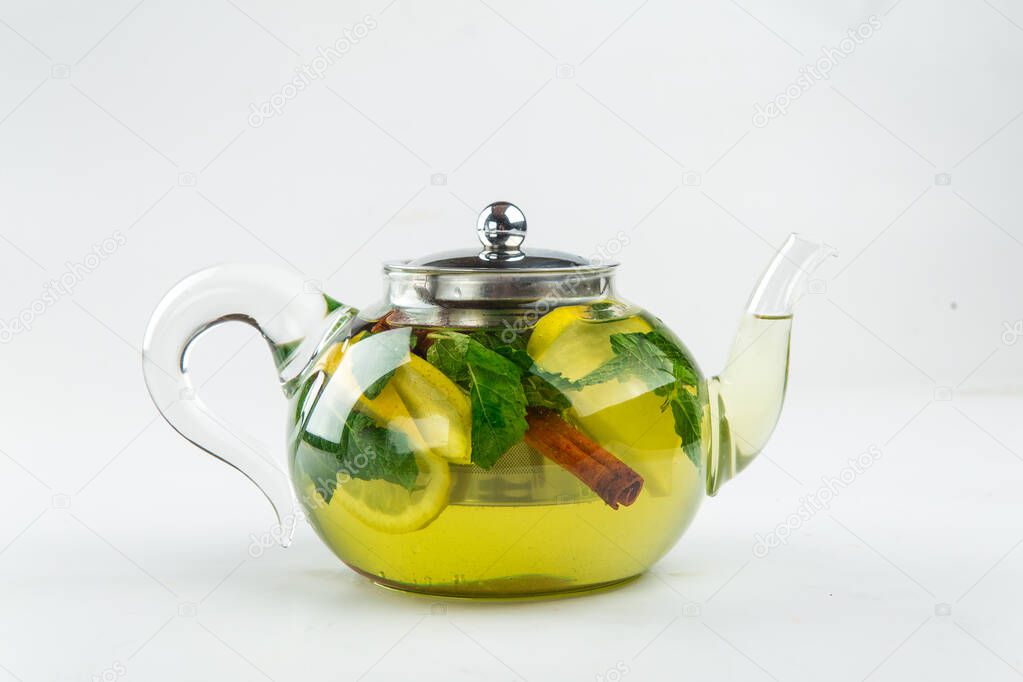 Isolated teapot of apple tea