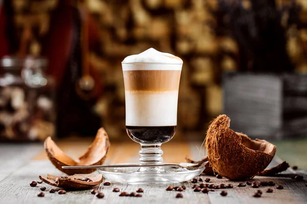 Coffee mocaccino decorated with coconut shell — Stock Photo, Image