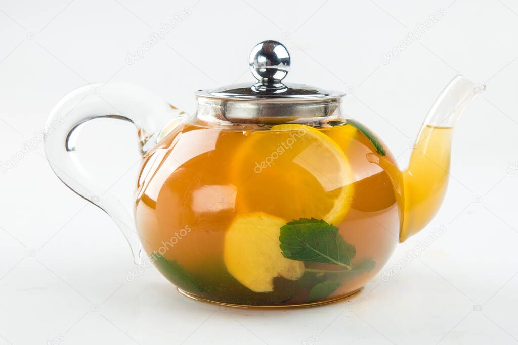 Isolated teapot of citrus tea