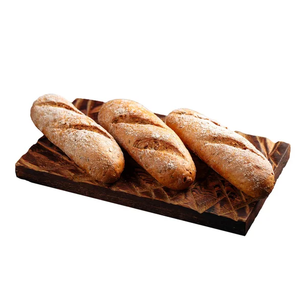 Isolated three loafs of white bread on a board — Stock Photo, Image