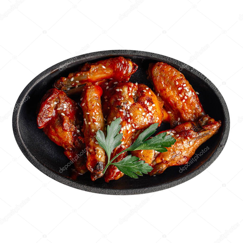 Isolated plate of fried wings in teriyaki sauce