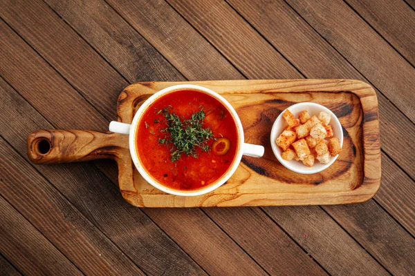 Russian soup solyanka with smoked meats — Stock Photo, Image