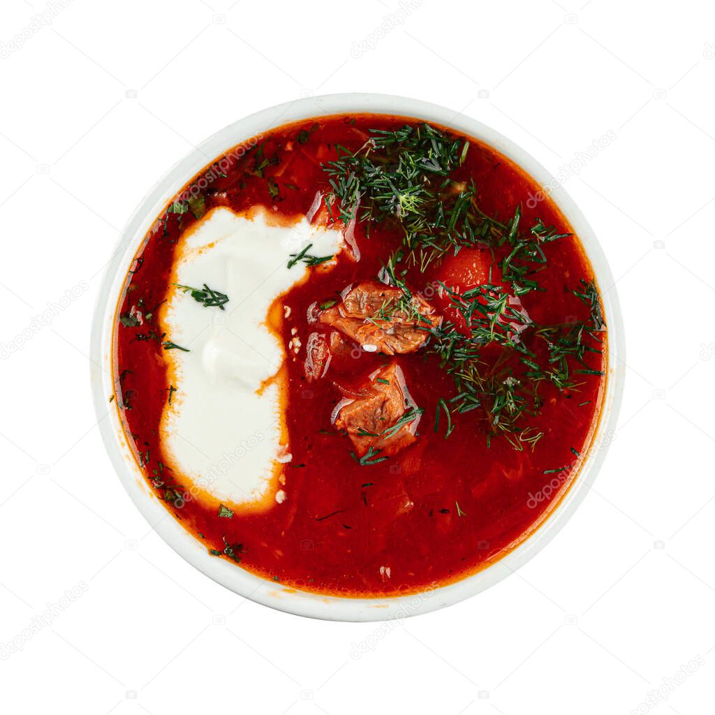 Isolated beet root soup borscht with sour cream