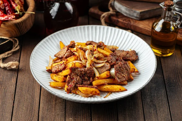 Beef meat roast with potato fries — Stock Photo, Image