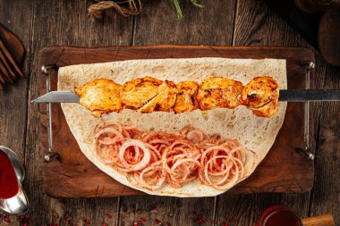 Grilled georgian chicken breast shashlik skewers