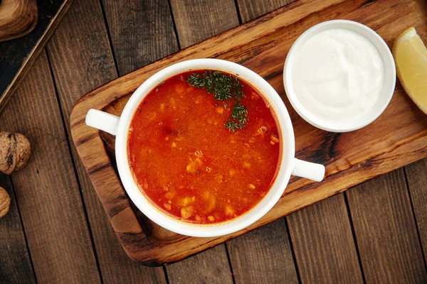Russian dish solyanka prefabricated meat soup — Stock Photo, Image