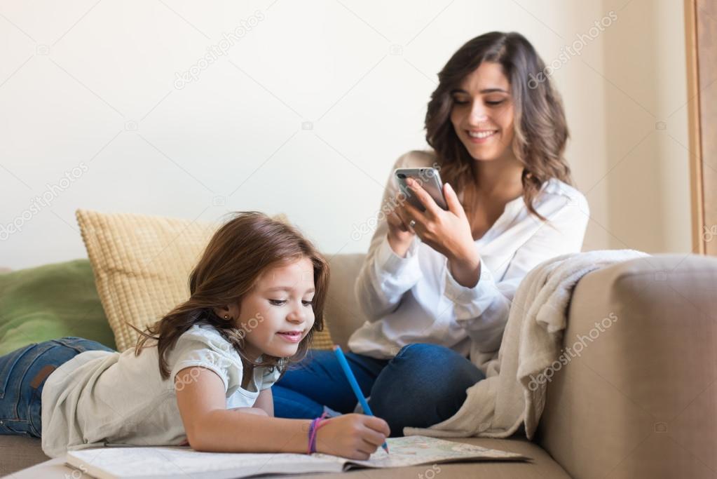 girl painting in the living room