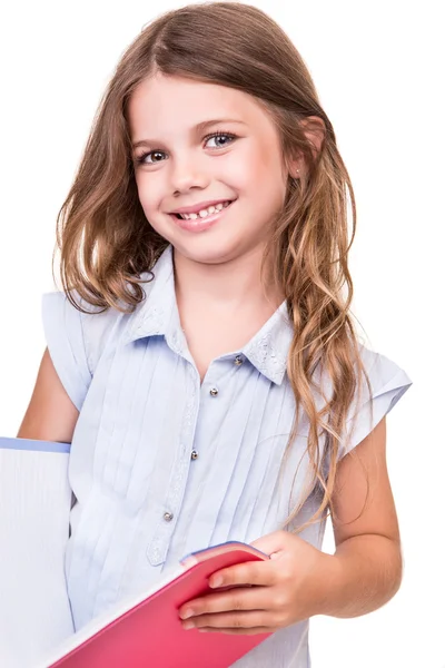 Menina agarrando livro — Fotografia de Stock