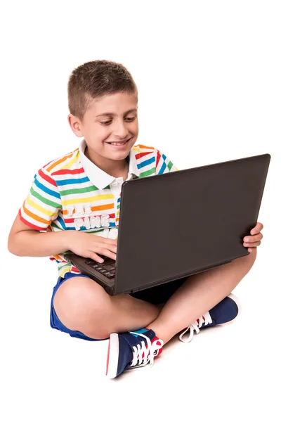 Kid using a computer — Stock Photo, Image