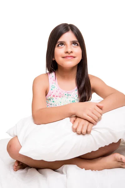 Girl hugging pillow — Stock Photo, Image