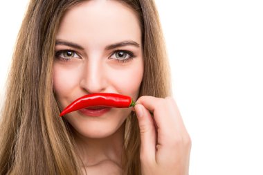 Woman eating pepper clipart