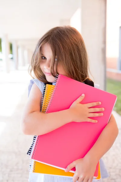 Girl holding books — Stock Photo, Image
