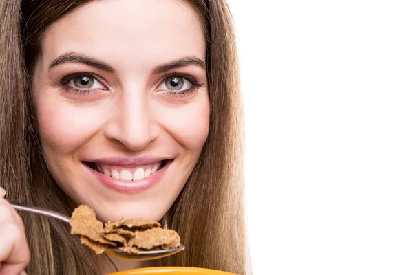 Mulher comendo cereais — Fotografia de Stock