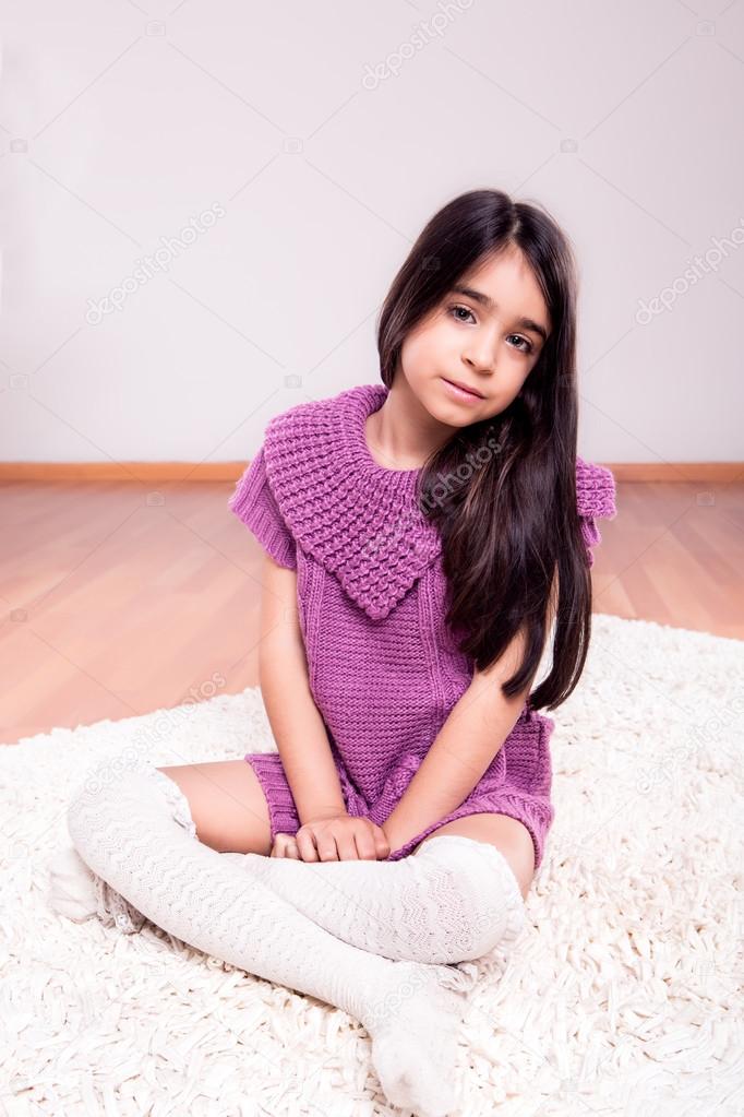 Girl sitting on the floor