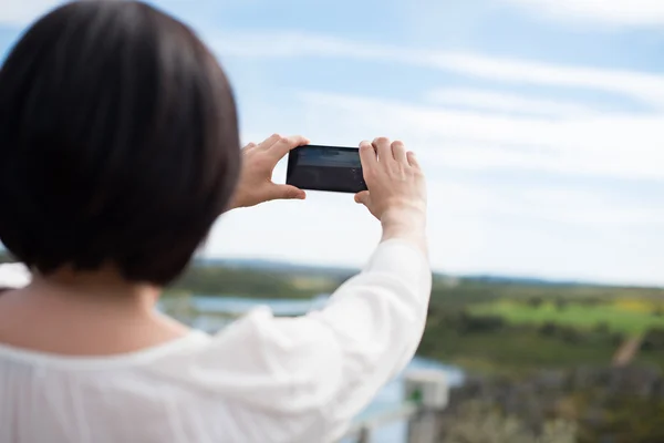 Mujer tomando fotos —  Fotos de Stock