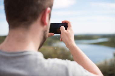 Fotoğraf çeken adam.