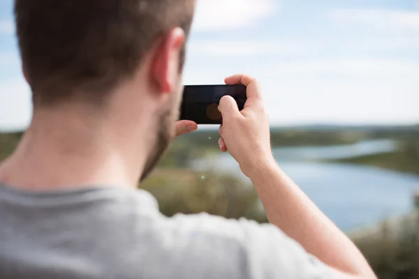 Man maakt foto 's — Stockfoto