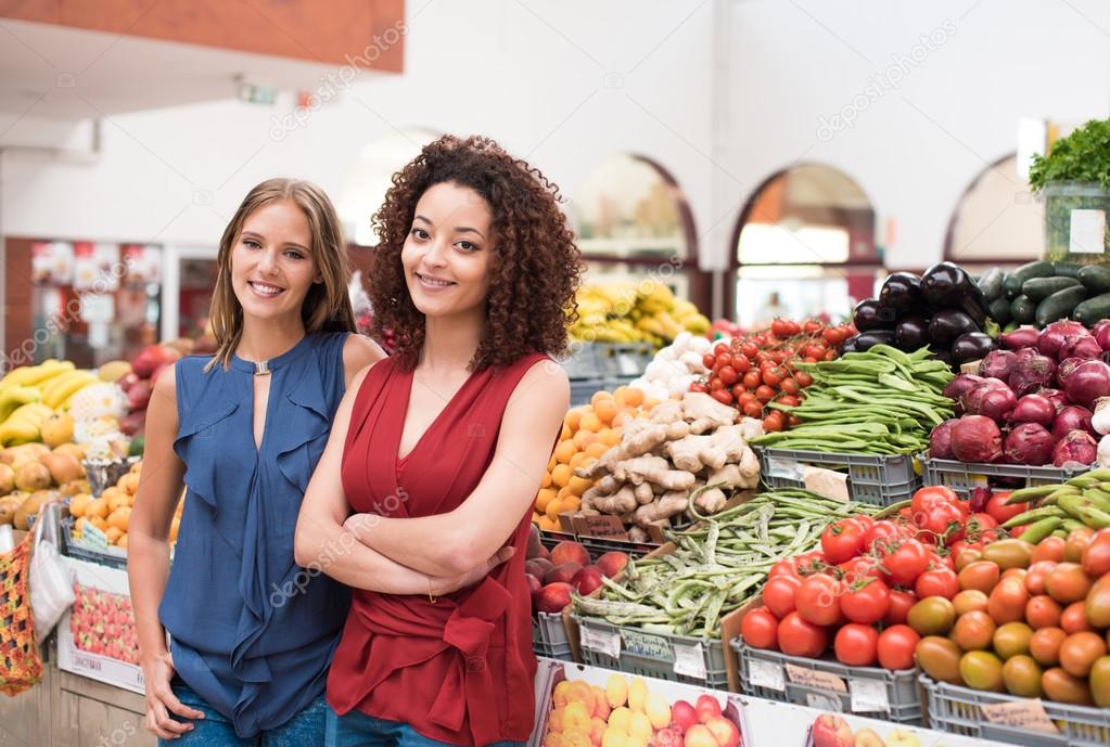 Women at greengrocer