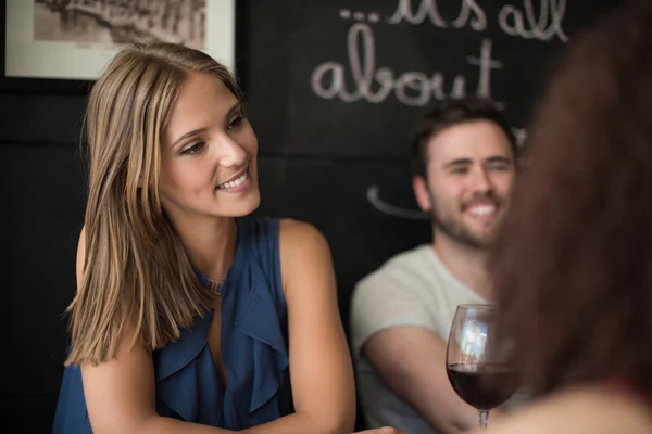 Friends in bar — Stock Photo, Image