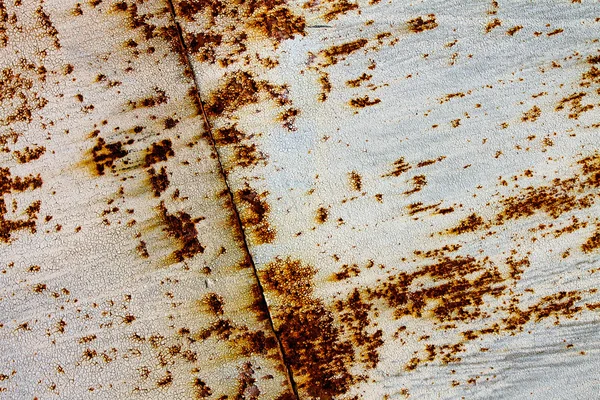 Fondo abstracto con una plancha oxidada — Foto de Stock