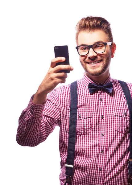 Mann hält Smartphone in der Hand — Stockfoto