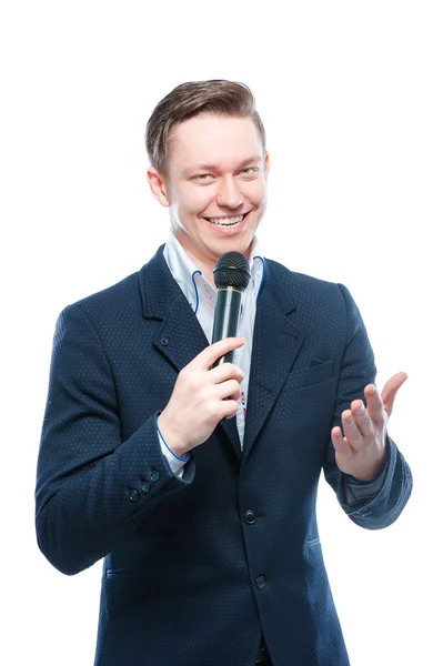 Young man holding microphone — Stock Photo, Image