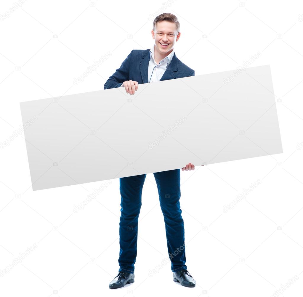 Business man holding big blank
