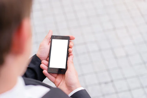 Manos sosteniendo smartphone . — Foto de Stock