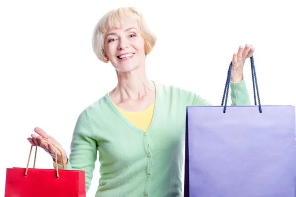 Mujer sosteniendo bolsas de compras —  Fotos de Stock