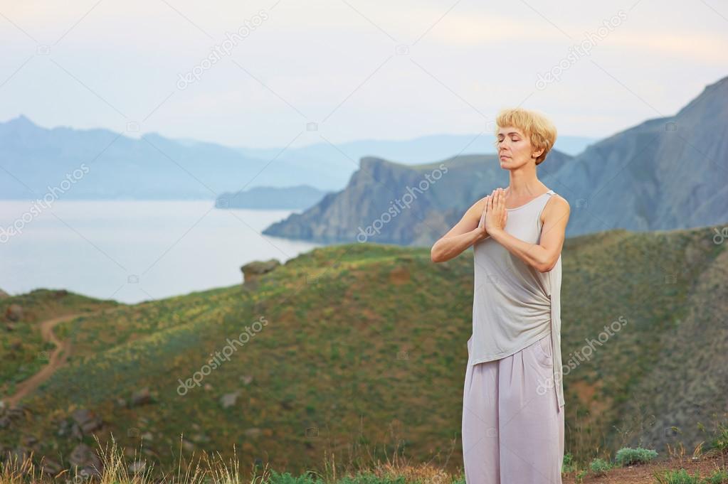 Woman doing yoga exercises