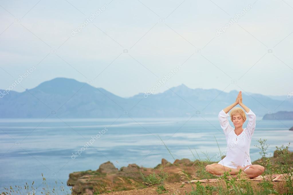 Woman doing yoga exercises