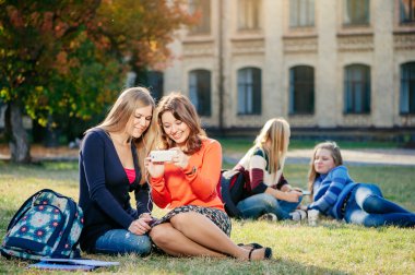 Two women with smart phone