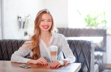 Young woman with coffee