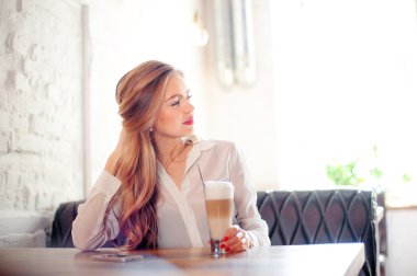 Young woman with coffee
