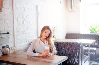Young woman with coffee