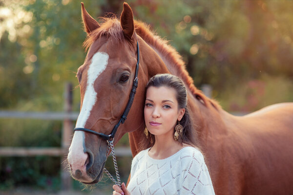 Woman with brown horse