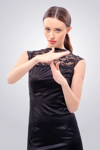 Mujer haciendo un gesto de tiempo fuera — Foto de Stock