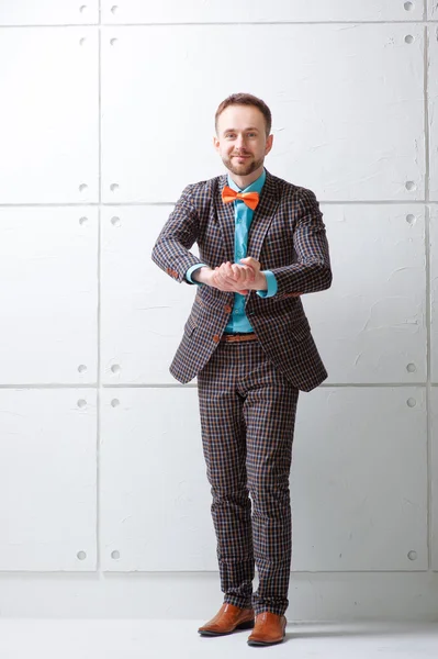 Man in plaid suit and bow tie — Stok fotoğraf