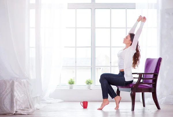 Beautiful young woman stretching — Stock Photo, Image