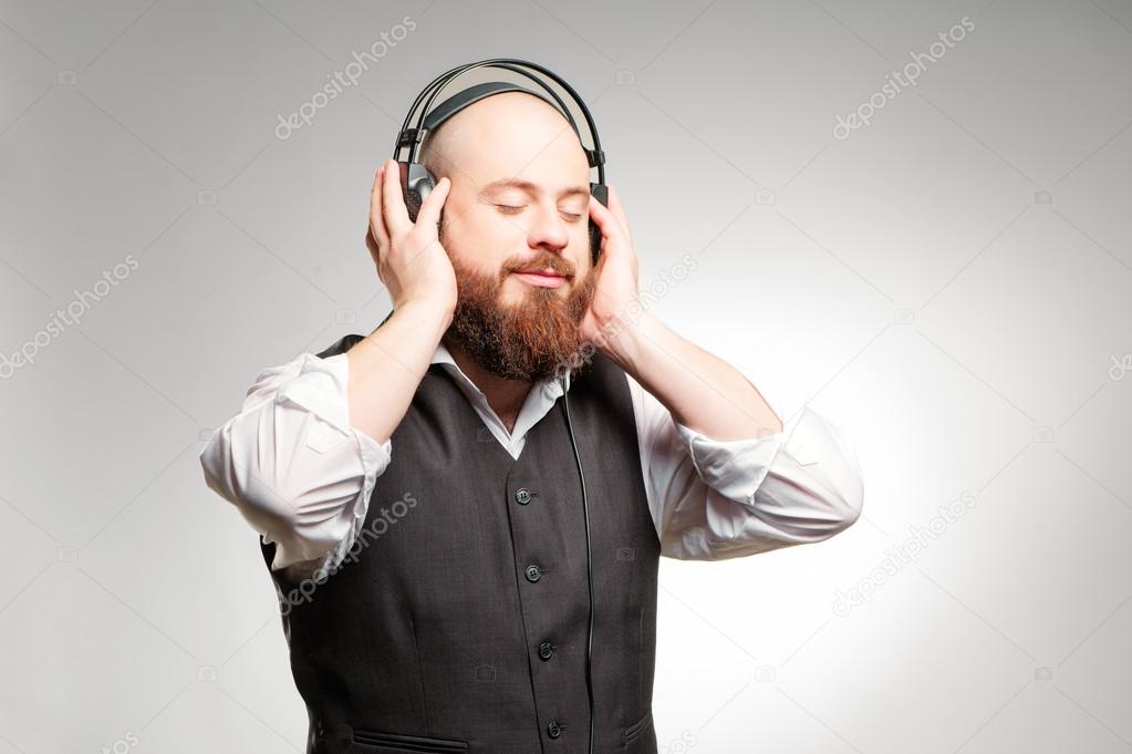 Bearded man in headphones