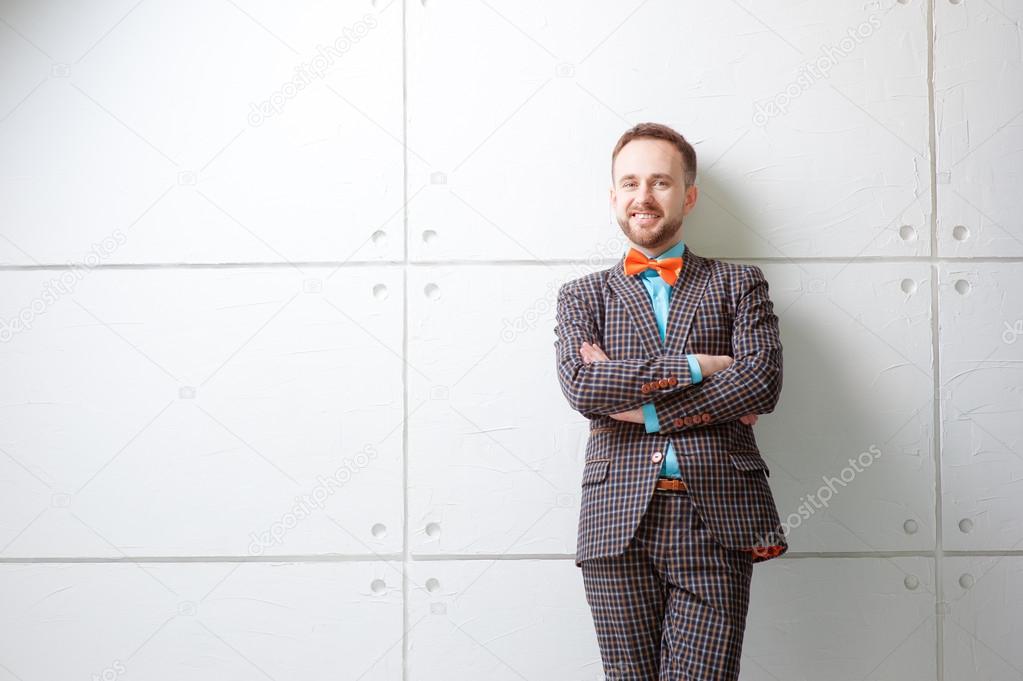 Bearded man in plaid suit