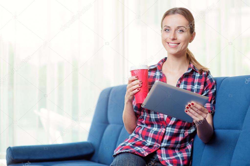 Young woman using tablet pc