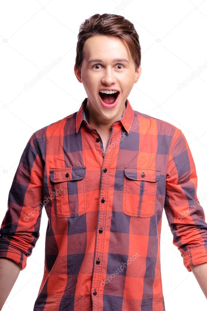 Amazed young man with mouth opened