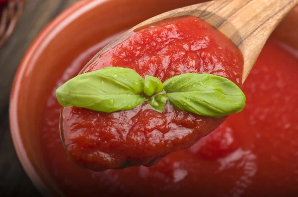 Spoon with tomato — Stock Photo, Image