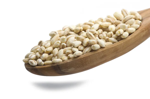Spoon of Pearl barley — Stock Photo, Image