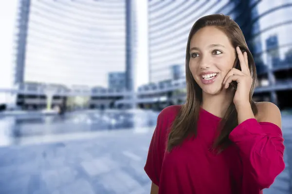 Girl talks by mobile phone — Stock Photo, Image