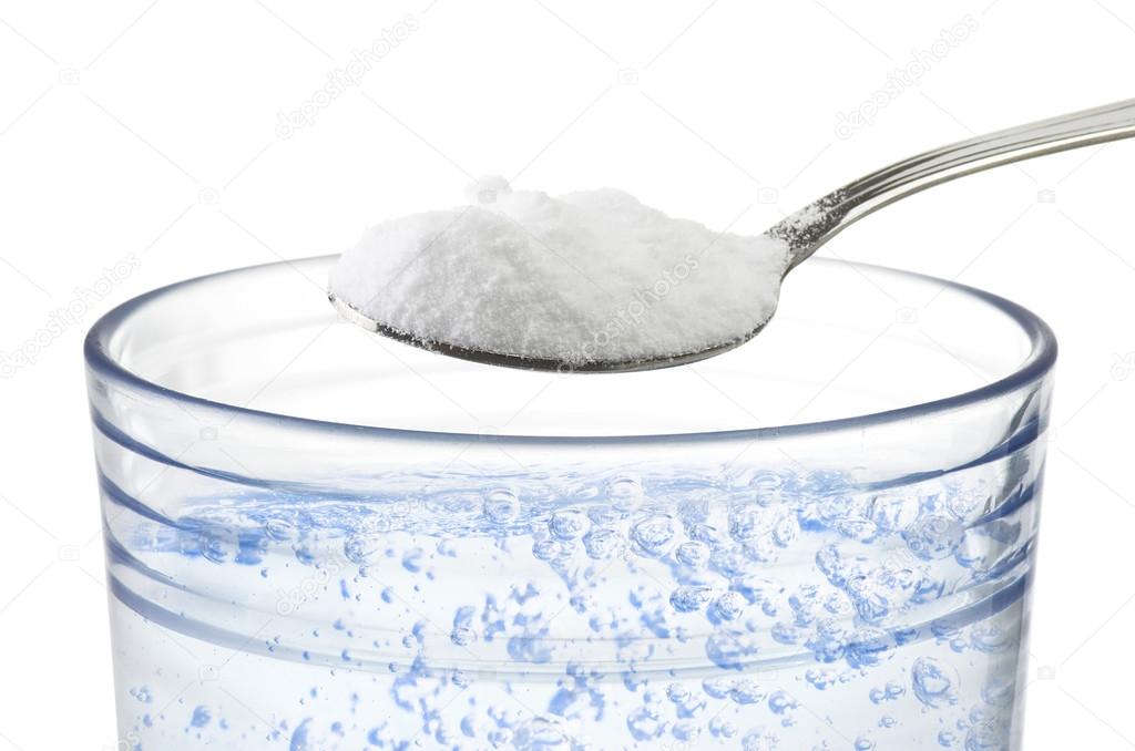 Spoon of baking soda — Stock Photo © Orlando.B 67438155