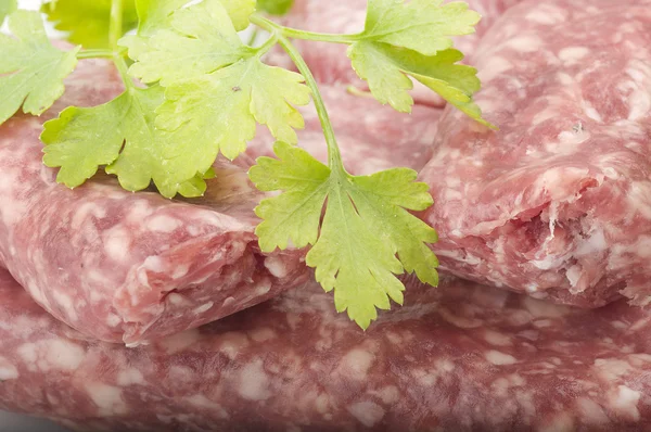 Sausage with parsley — Stock Photo, Image