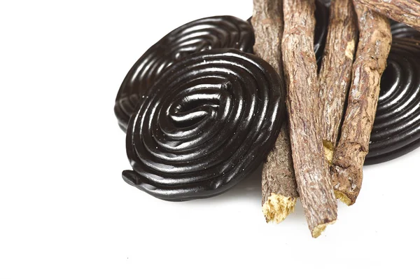 Licorice roots and licorice black — Stock Photo, Image